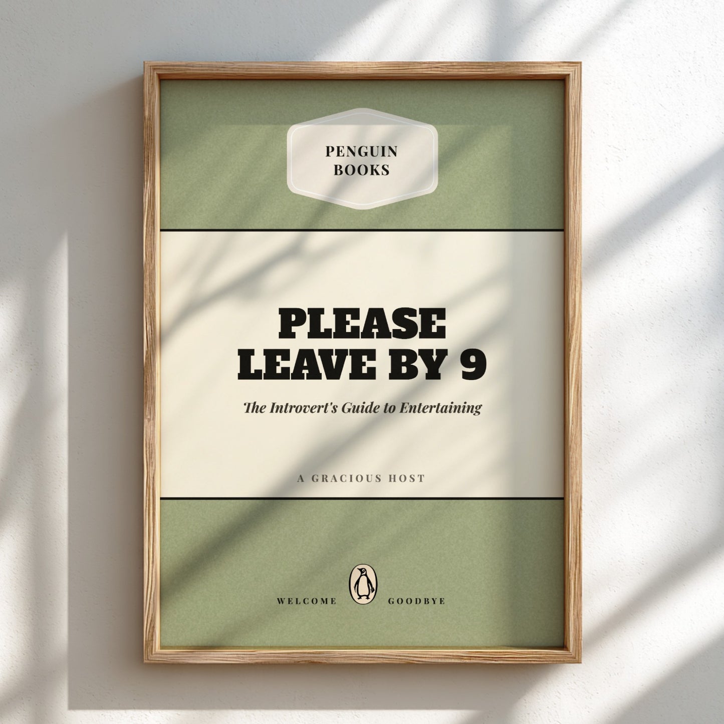 Framed Penguin Books poster with text 'Please Leave by 9' on a light background