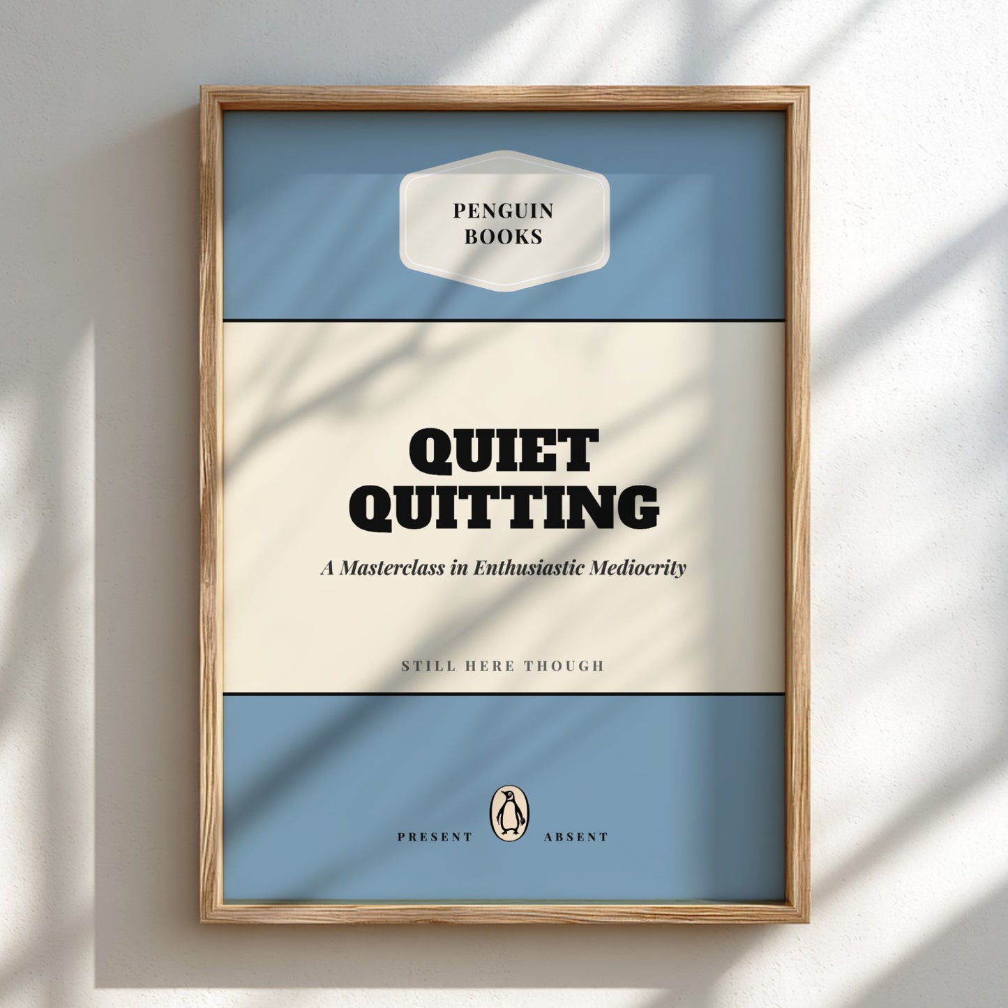 Framed book cover with 'Penguin Books' logo and text 'Quiet Quitting' on a light background