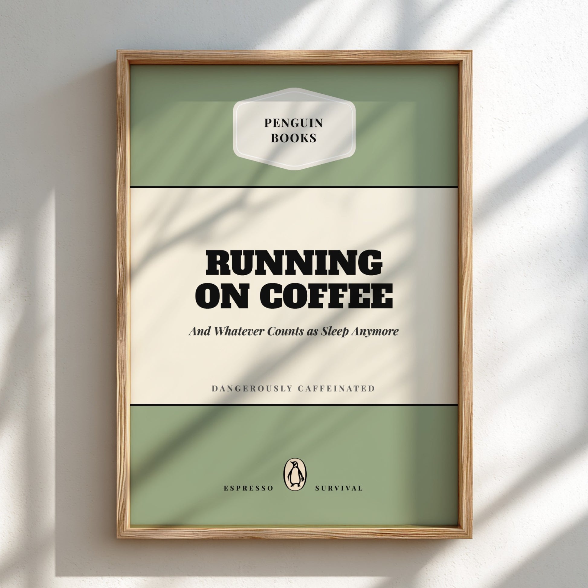 Framed book cover with 'Penguin Books' branding and text 'Running on Coffee'.