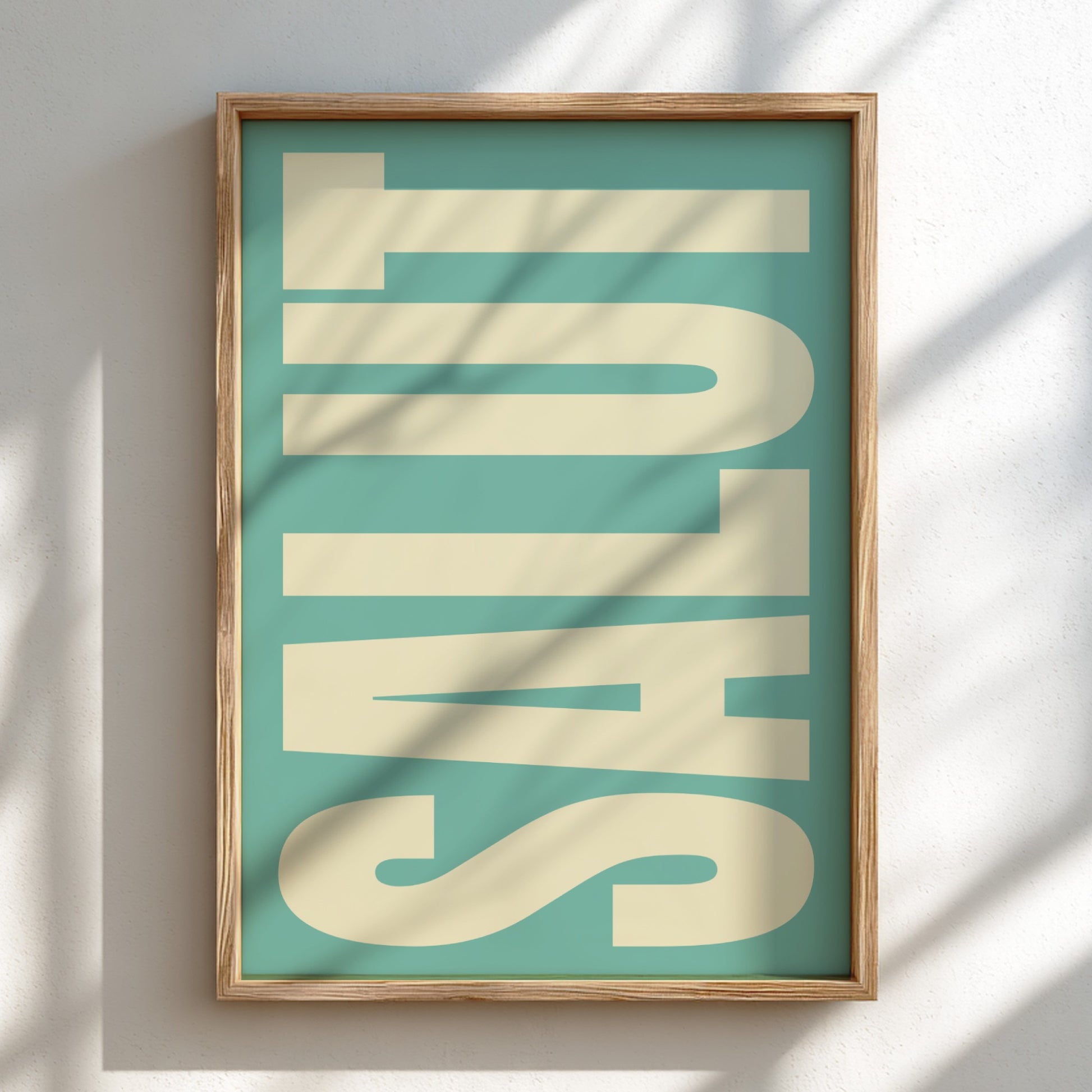 Framed artwork with 'SALUT' text on a teal background