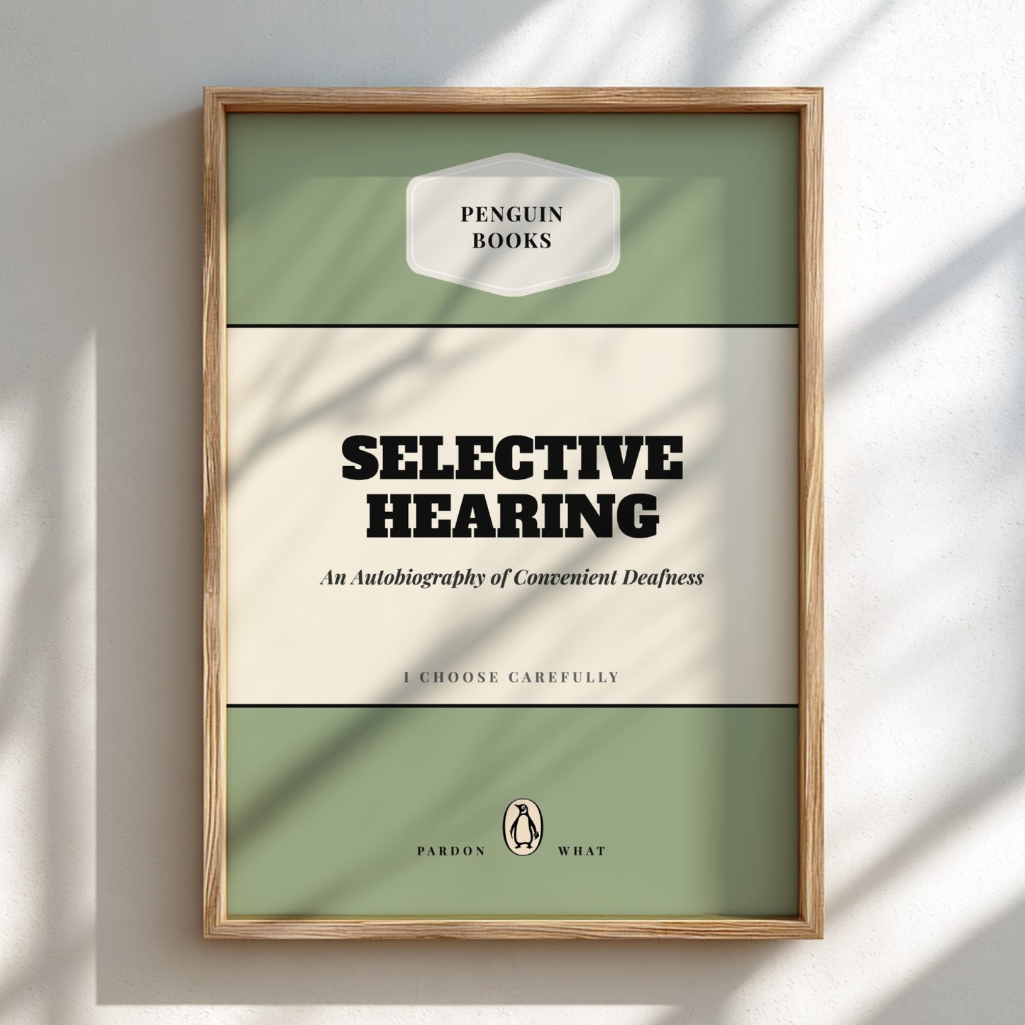 Framed book cover of 'Selective Hearing' by Penguin Books on a light background