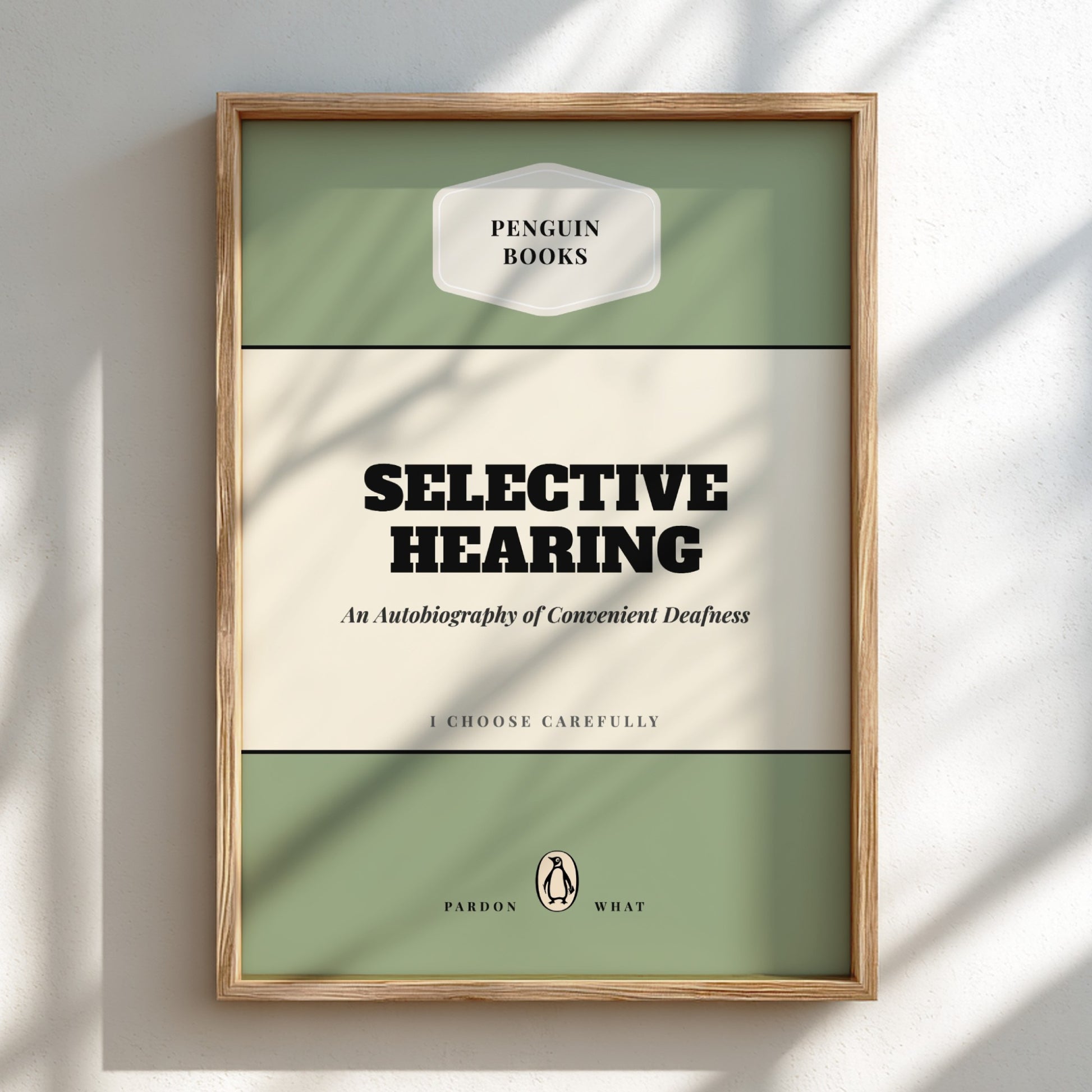 Framed book cover of 'Selective Hearing' by Penguin Books on a light background