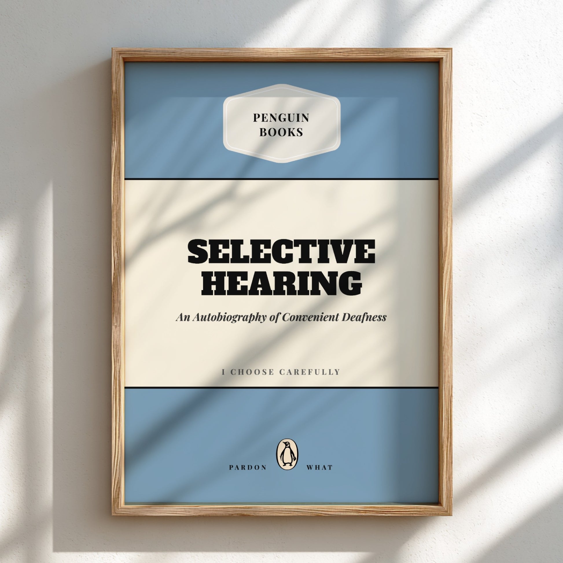 Framed book cover of 'Selective Hearing' by Penguin Books on a light background