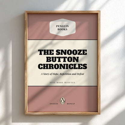 Framed book cover of 'The Snooze Button Chronicles' by Penguin Books on a light background