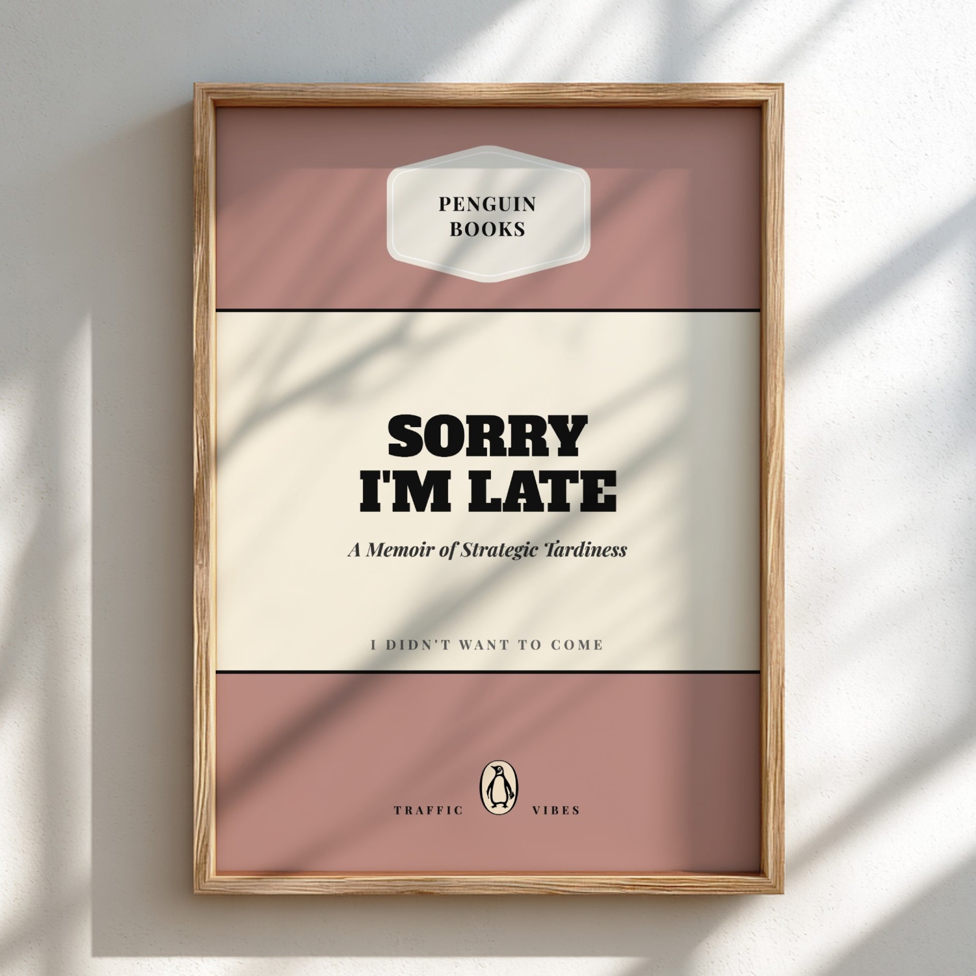 Framed book cover with 'Sorry I'm Late' text on a light background