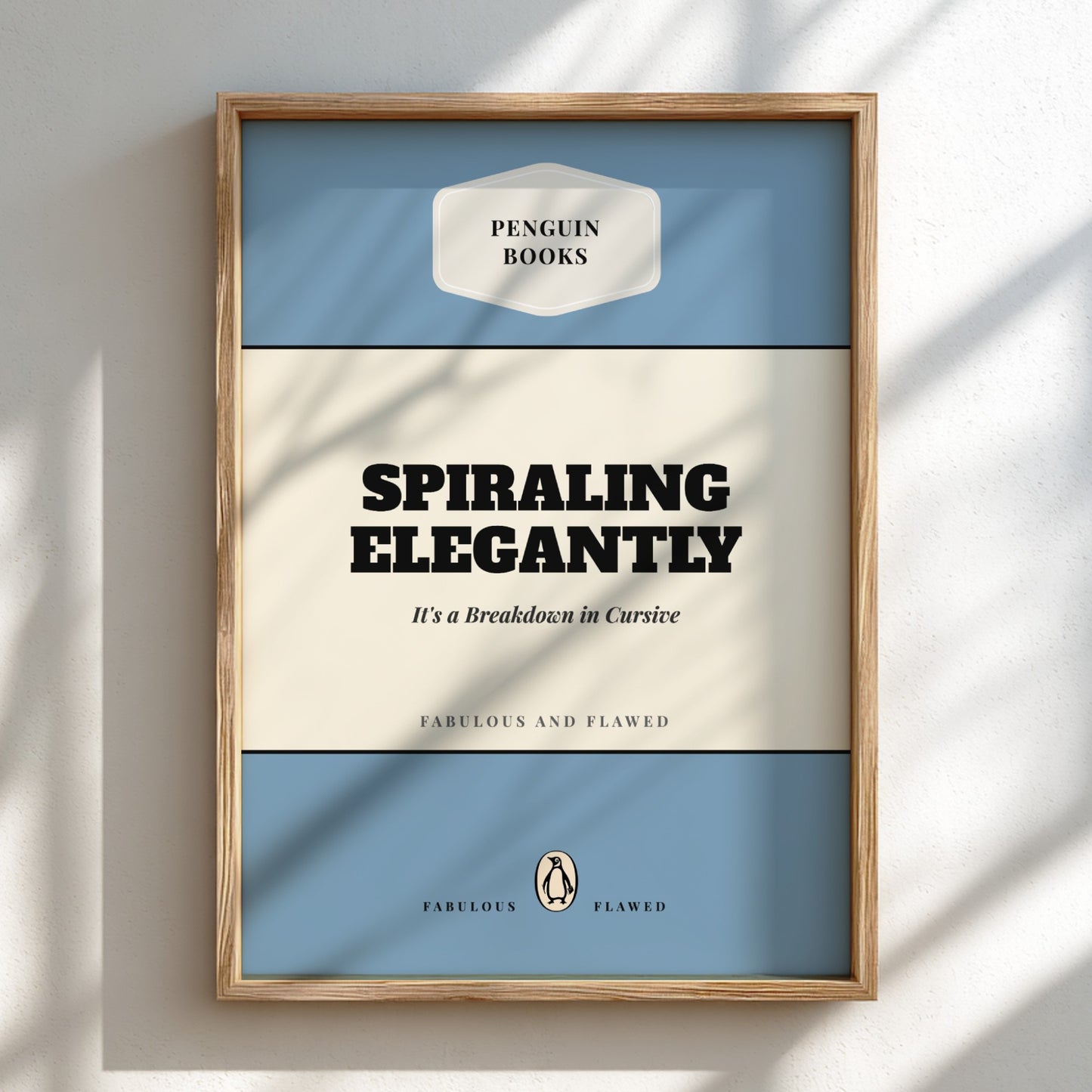 Framed poster of a Penguin Books design with text 'Spiraling Elegantly' on a light background