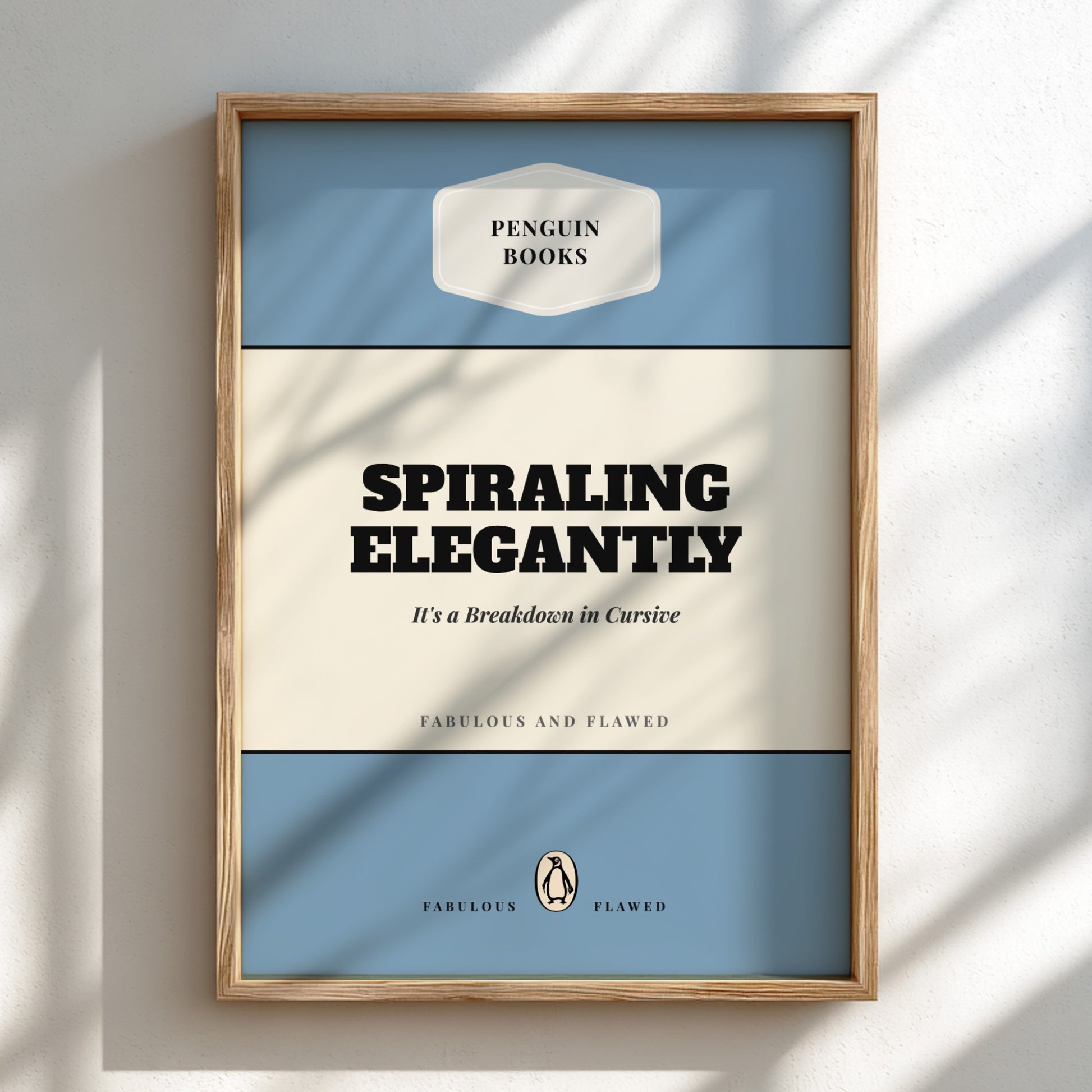 Framed poster of a Penguin Books design with text 'Spiraling Elegantly' on a light background
