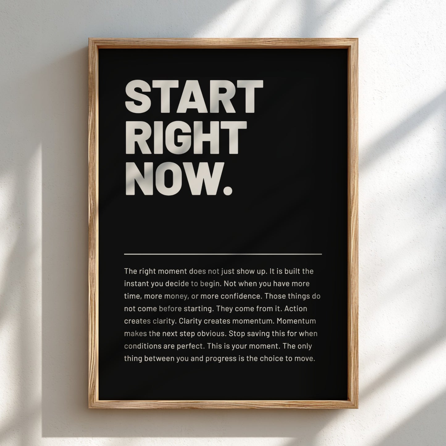 Framed poster with motivational quote 'Start Right Now' on a black background