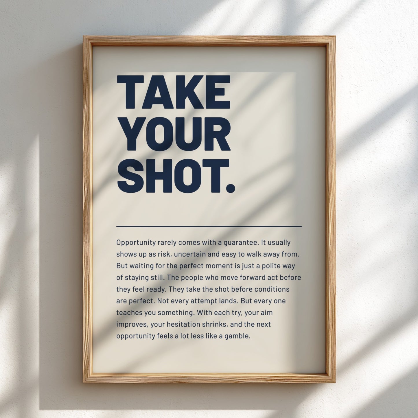 Framed motivational poster with text on a light background