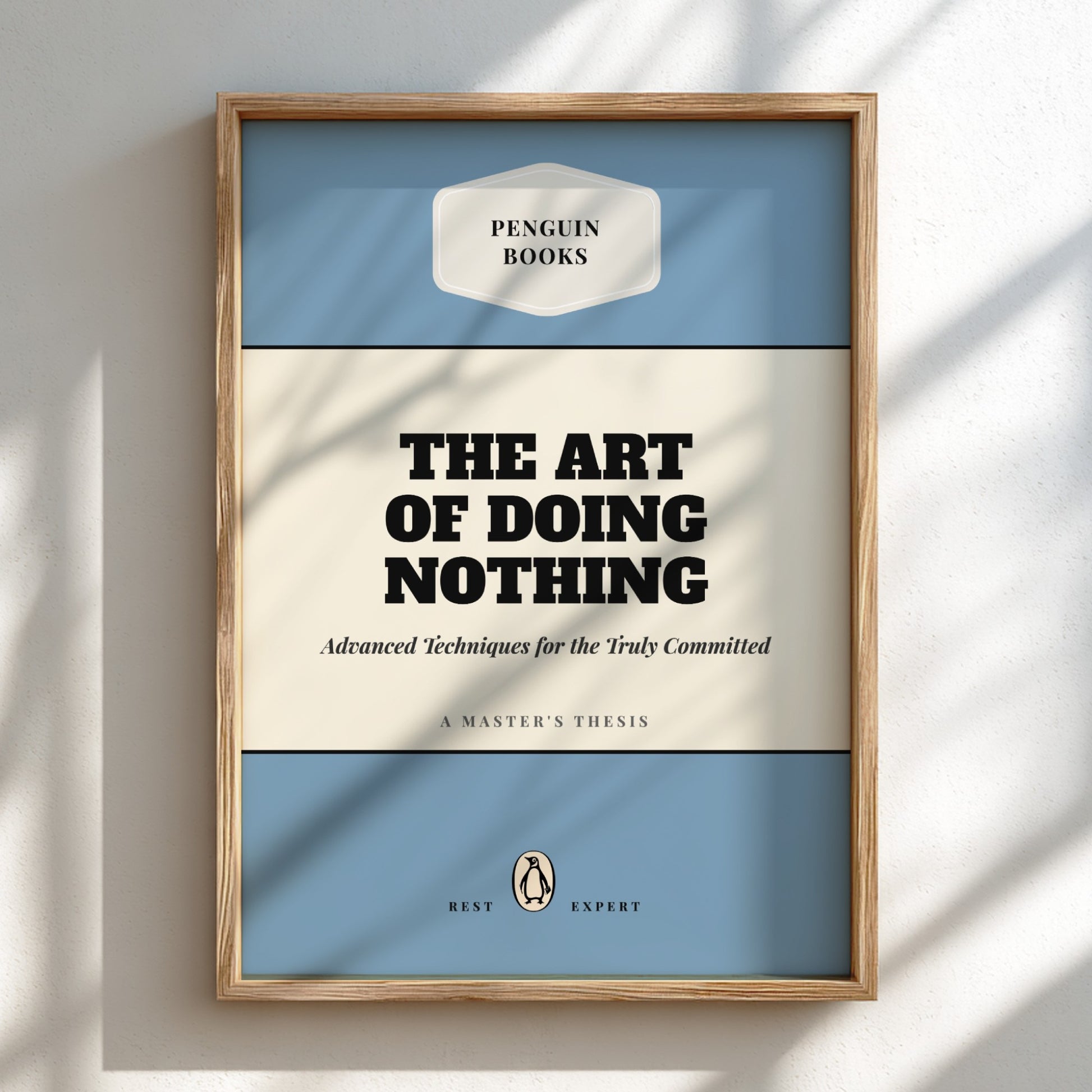 Framed book cover of 'The Art of Doing Nothing' by Penguin Books on a light background