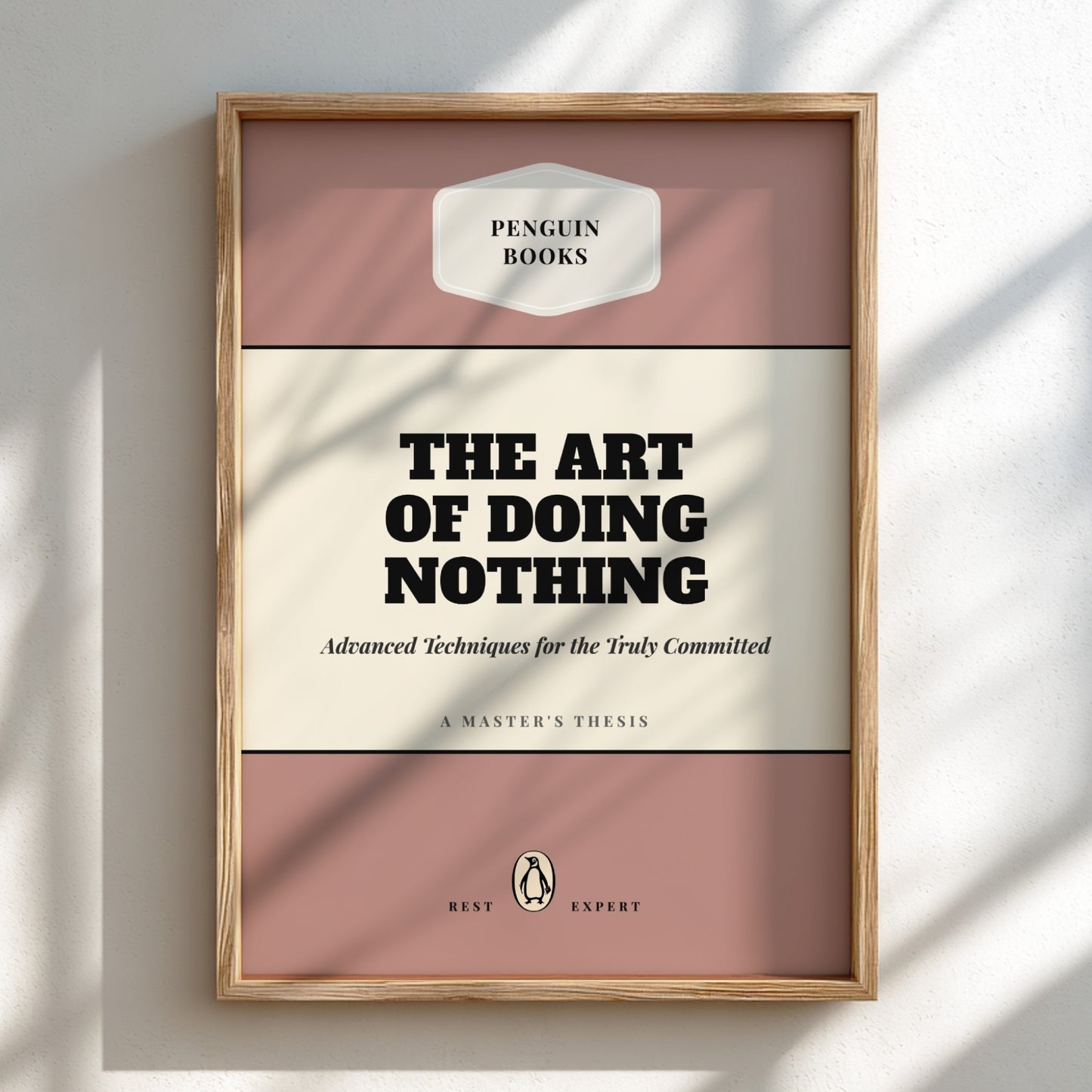 Framed book cover of 'The Art of Doing Nothing' by Penguin Books on a light background