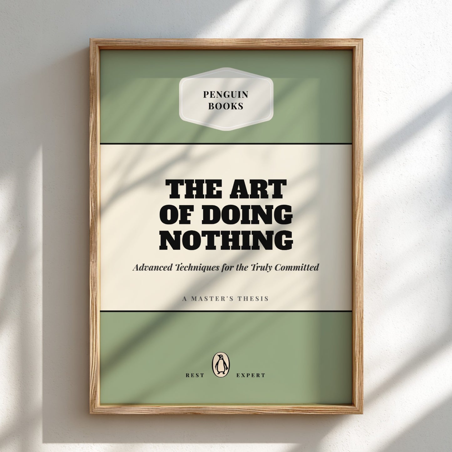 Framed book cover of 'The Art of Doing Nothing' by Penguin Books on a light background