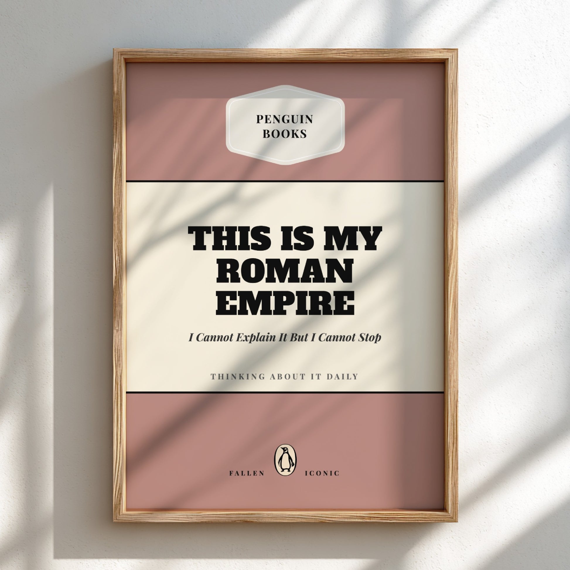 Framed poster with 'Penguin Books' logo and text on a light background