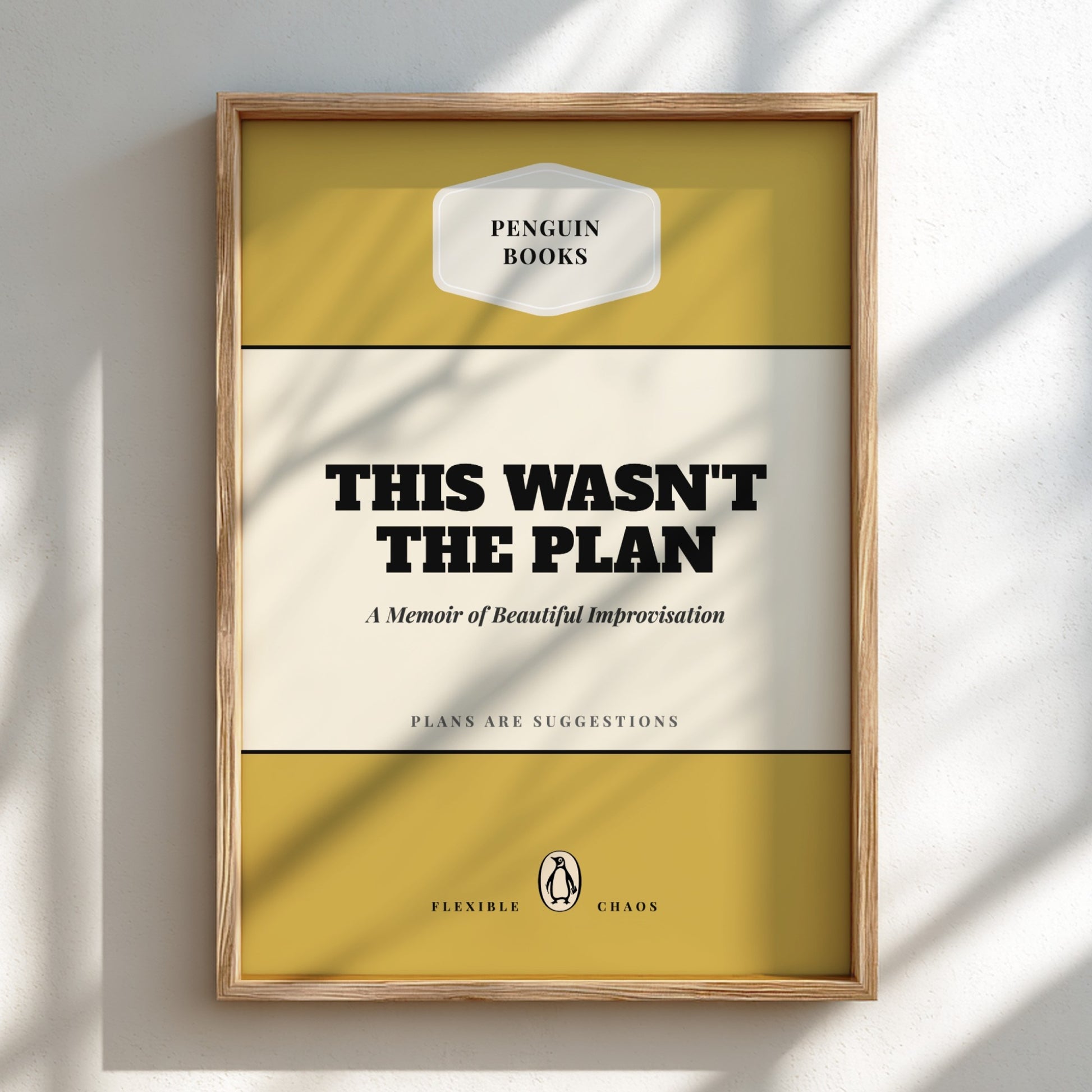 Framed book cover of 'This Wasn't the Plan' by Penguin Books on a light background