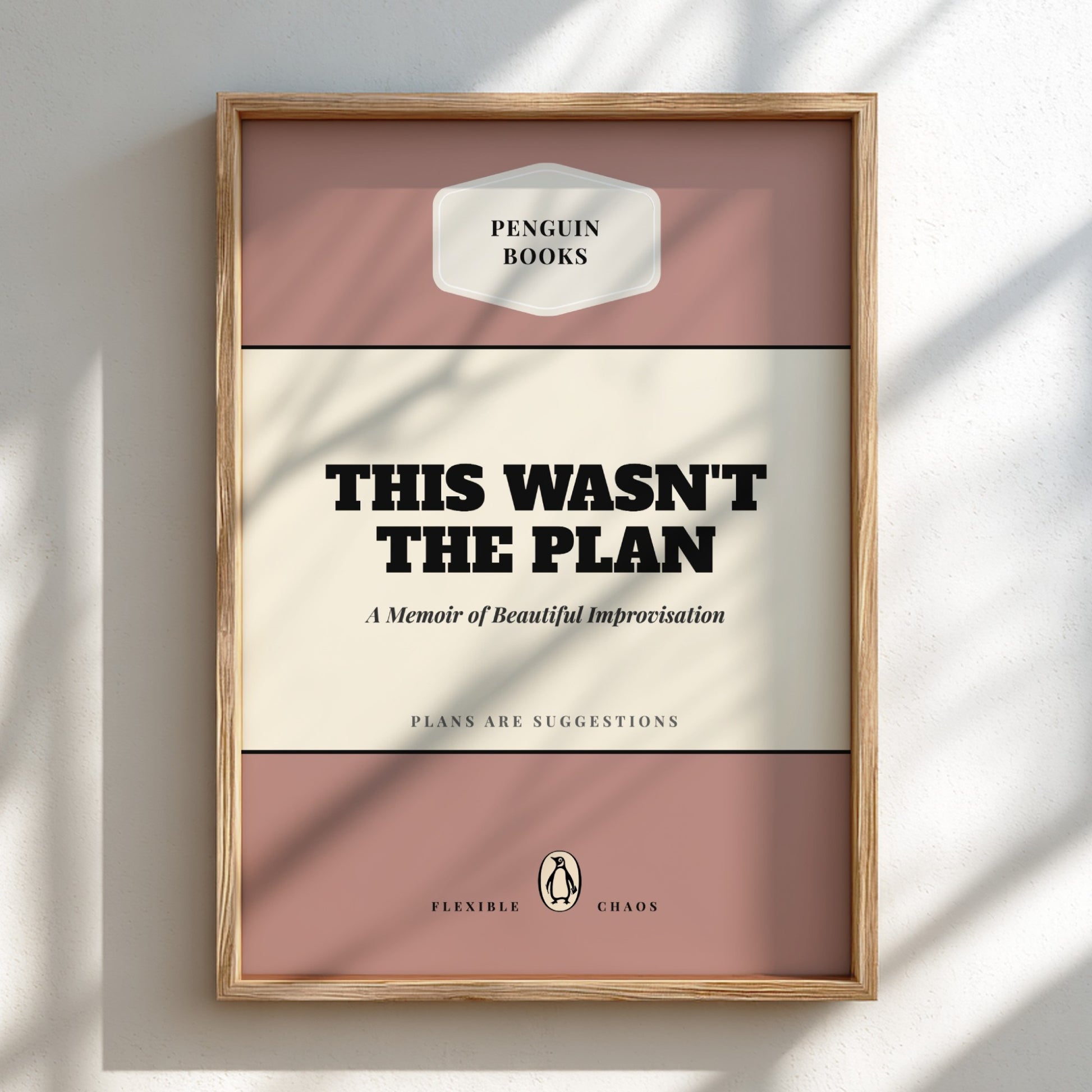 Framed book cover of 'This Wasn't the Plan' by Penguin Books on a light background