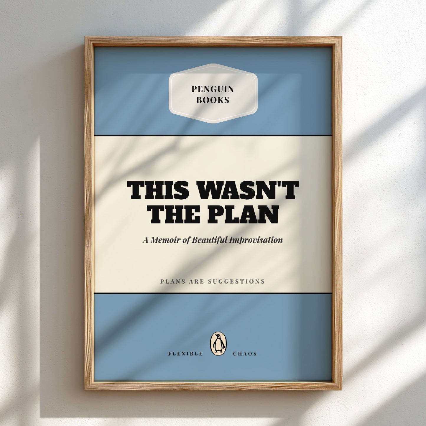 Framed book cover of 'This Wasn't the Plan' by Penguin Books on a light background