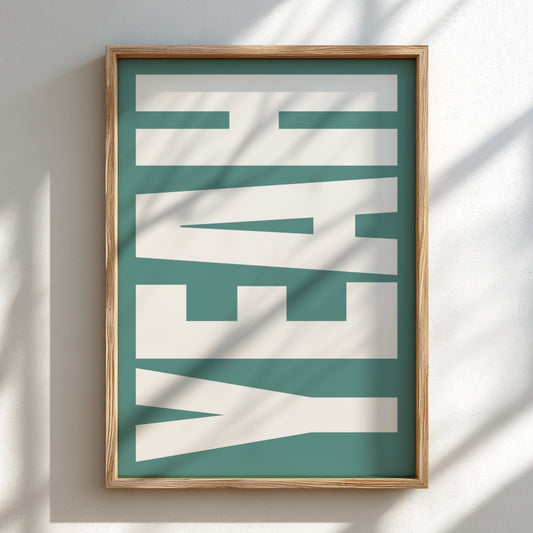 Framed artwork with 'YEAH!' text on a green background