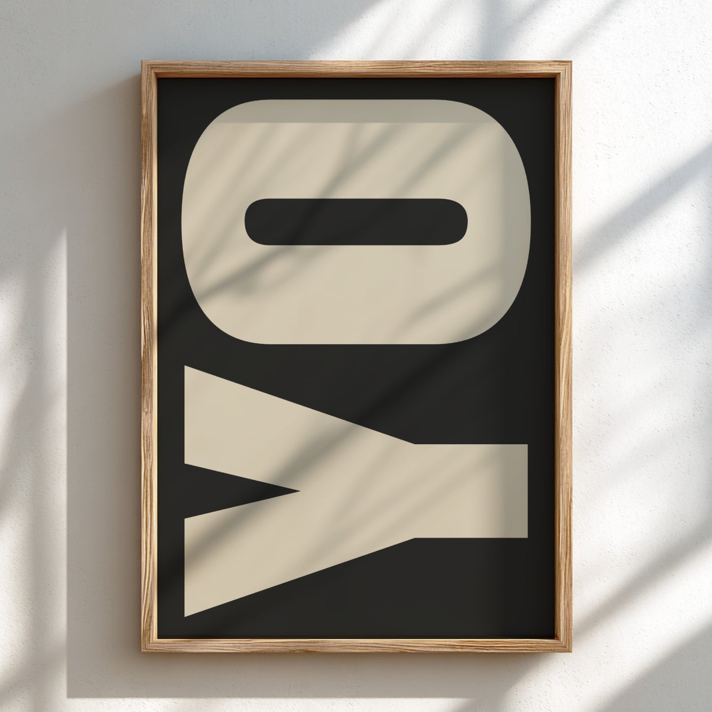 Framed artwork with abstract design on a light background