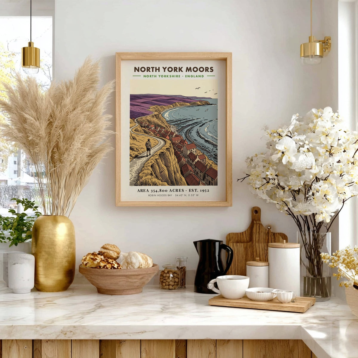 Poster of North York Moors with a hiker overlooking Robin Hoods Bay village.