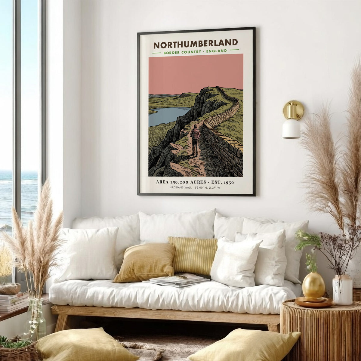Poster showing a hiker walking along Hadrian's Wall in the Northumberland border country landscape.