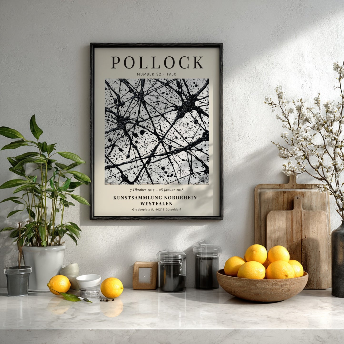 Wall art poster featuring Jackson Pollock Number 32 exhibition text with black ink splatters.