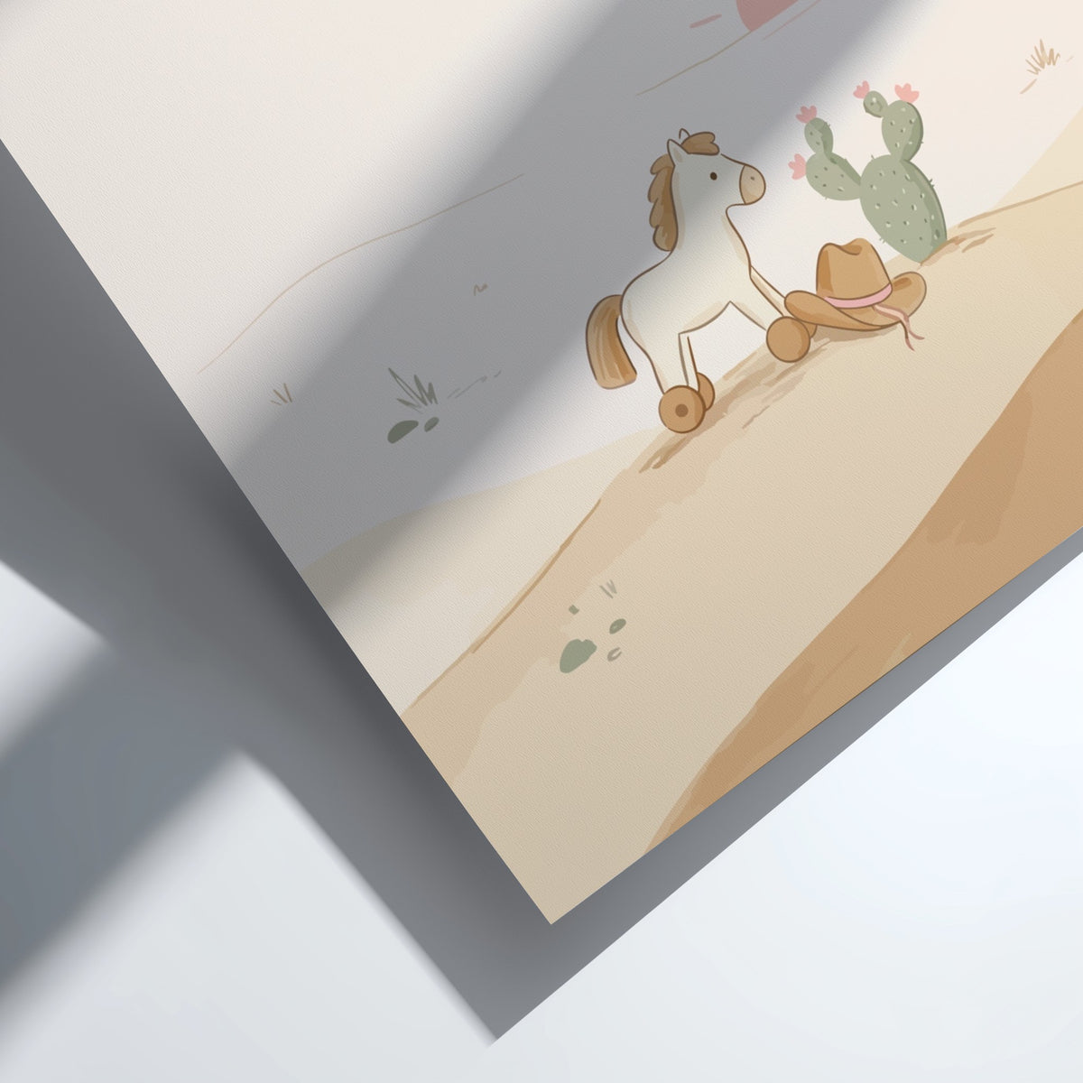 Poster featuring a toy horse and cowboy hat in a soft desert landscape.