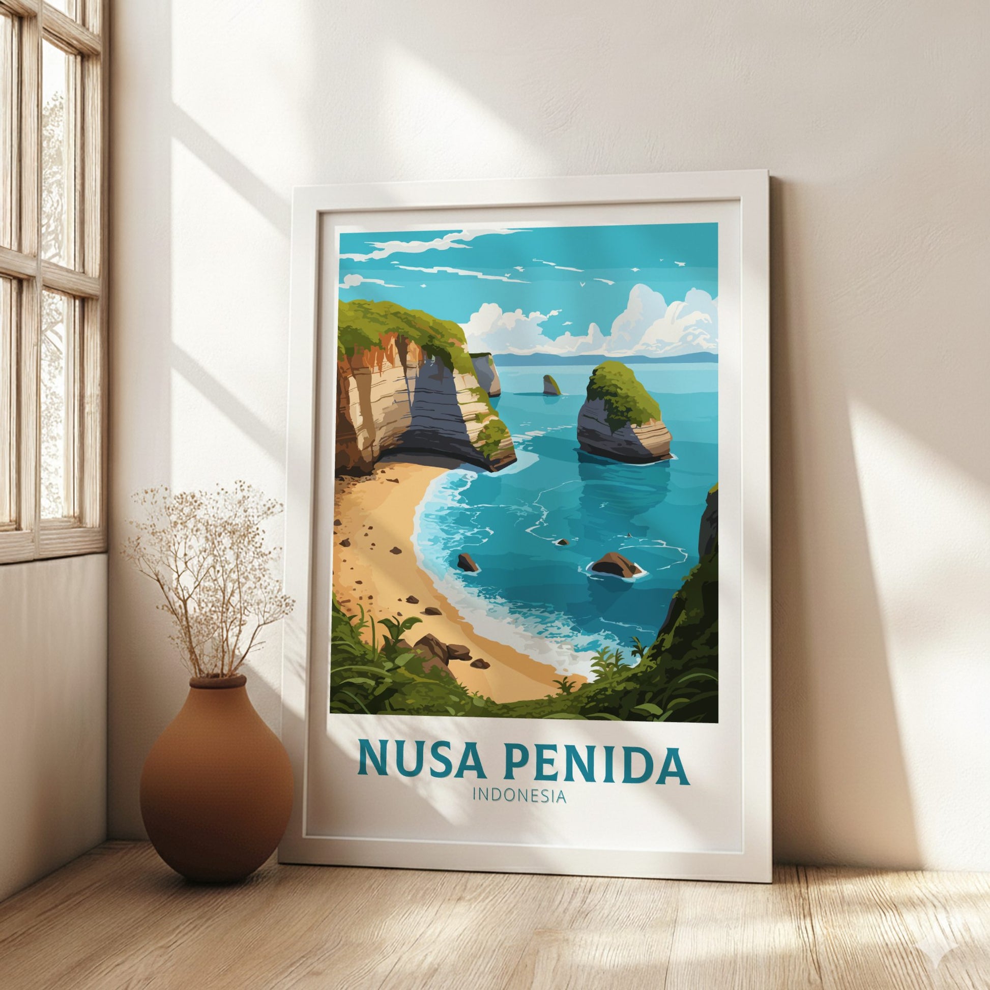 Framed artwork of Nusa Penida, Indonesia on a wall in a bright room with a vase.