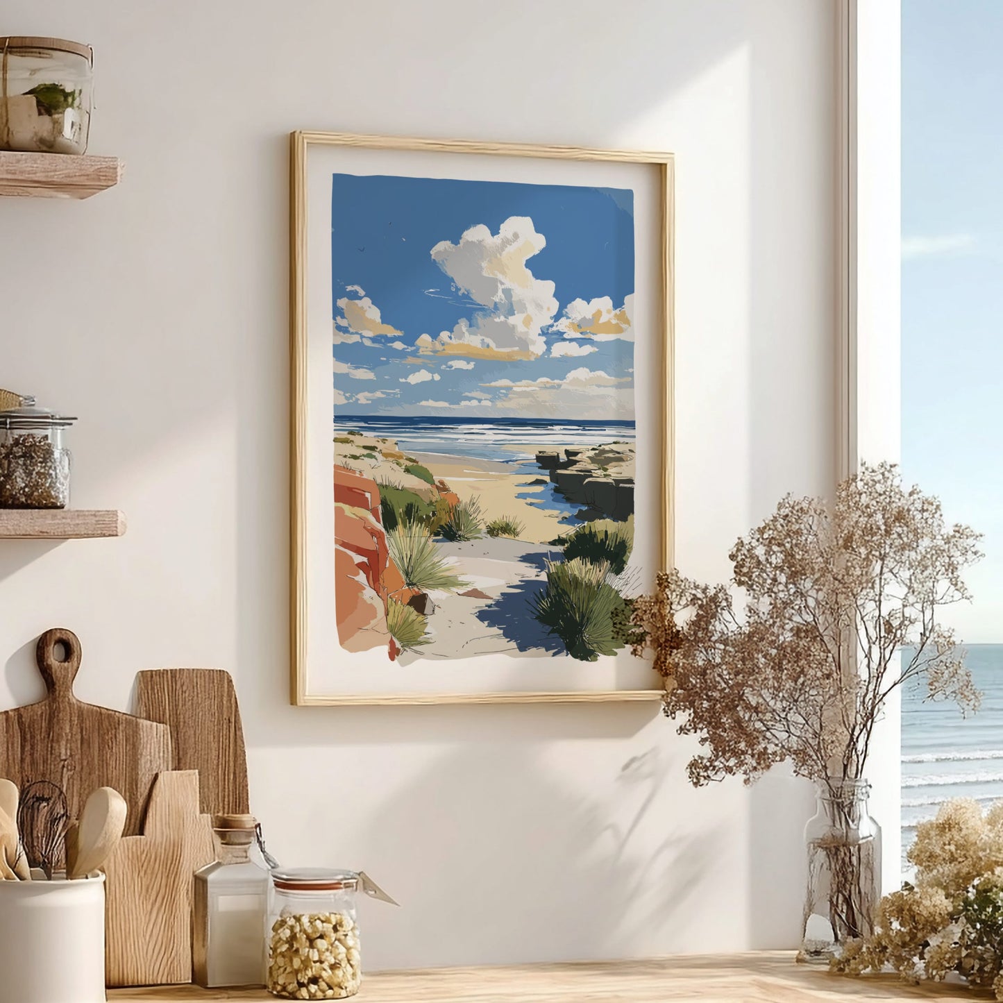 Framed beach artwork on a wall with wooden shelves and decor items.