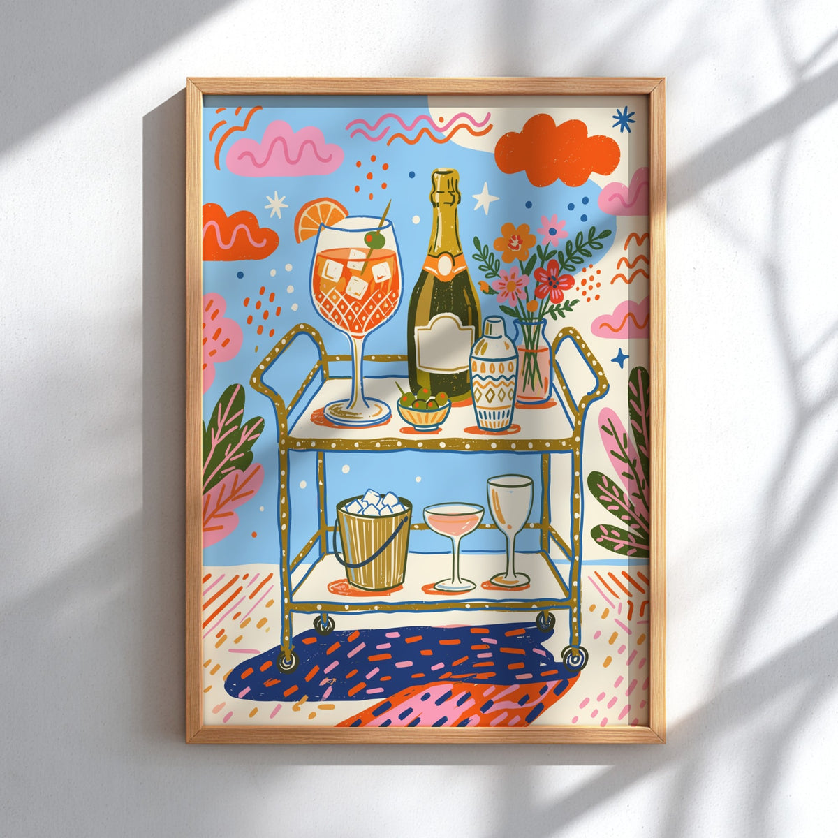 Poster featuring a bar cart with an orange spritz, bubbly, and olives in vibrant colours.