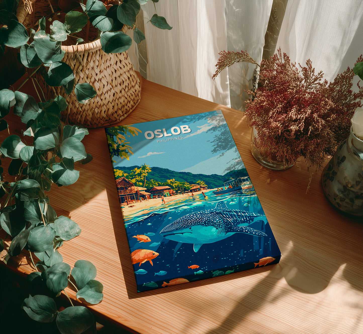 Book titled 'Oslob' on a wooden table with plants around