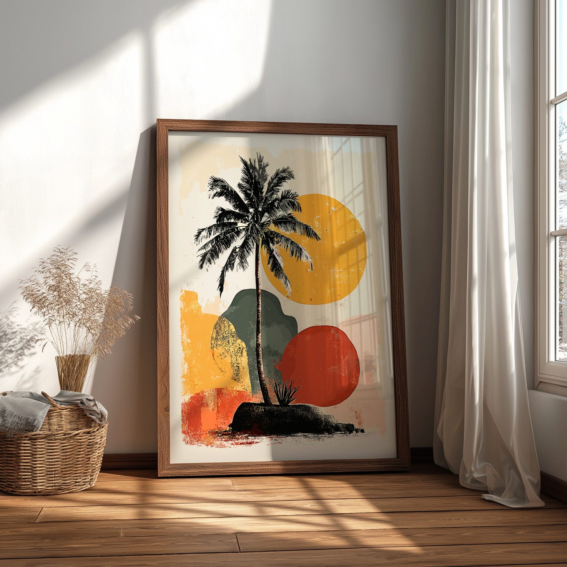 Framed artwork with a palm tree design in a room with a window and basket.