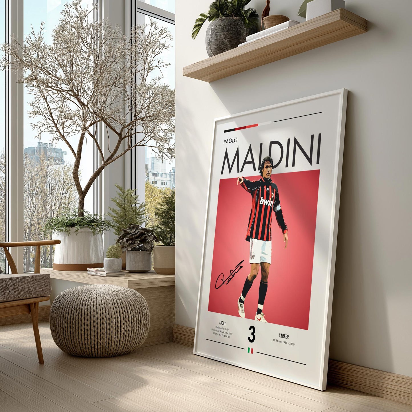 Framed poster of a soccer player on a wall in a modern living room.