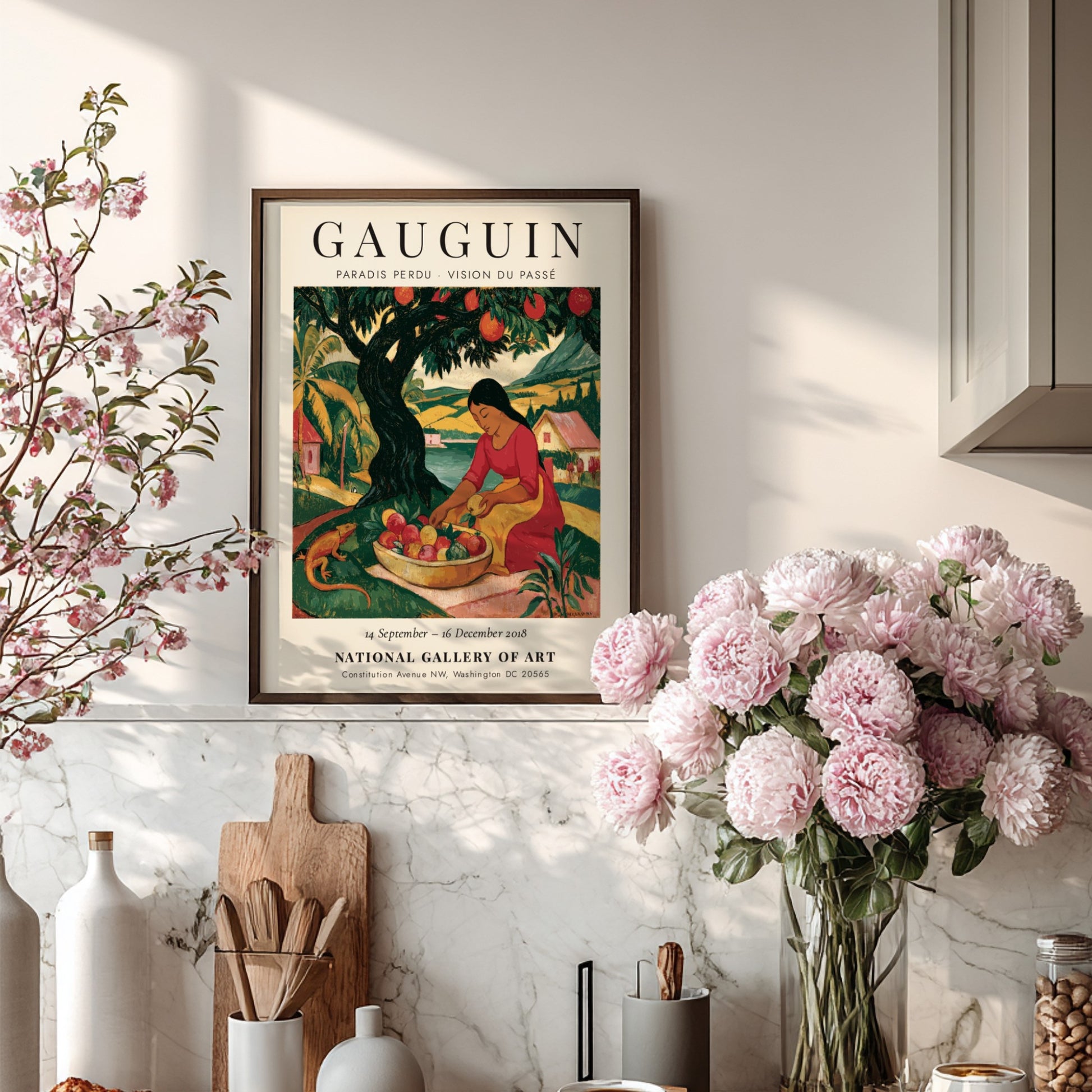Gauguin exhibition poster featuring vibrant colors and a woman gathering fruit in a tropical landscape