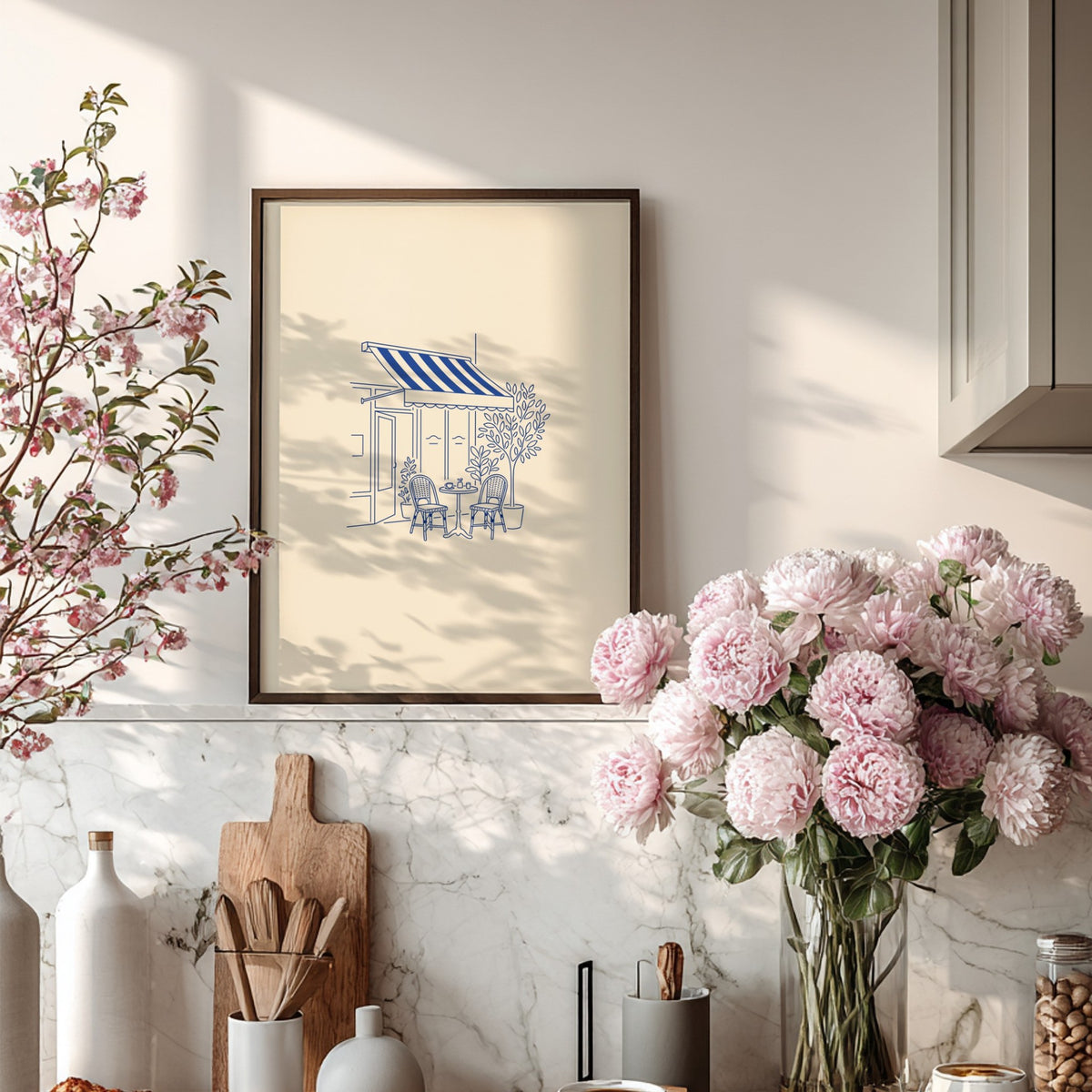 Poster featuring blue minimalist line art of a Parisian cafe with bistro chairs.