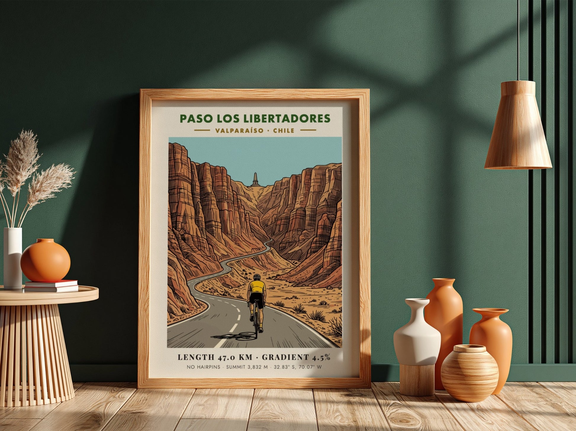 Cycling poster showing a rider on the winding Paso Los Libertadores mountain road