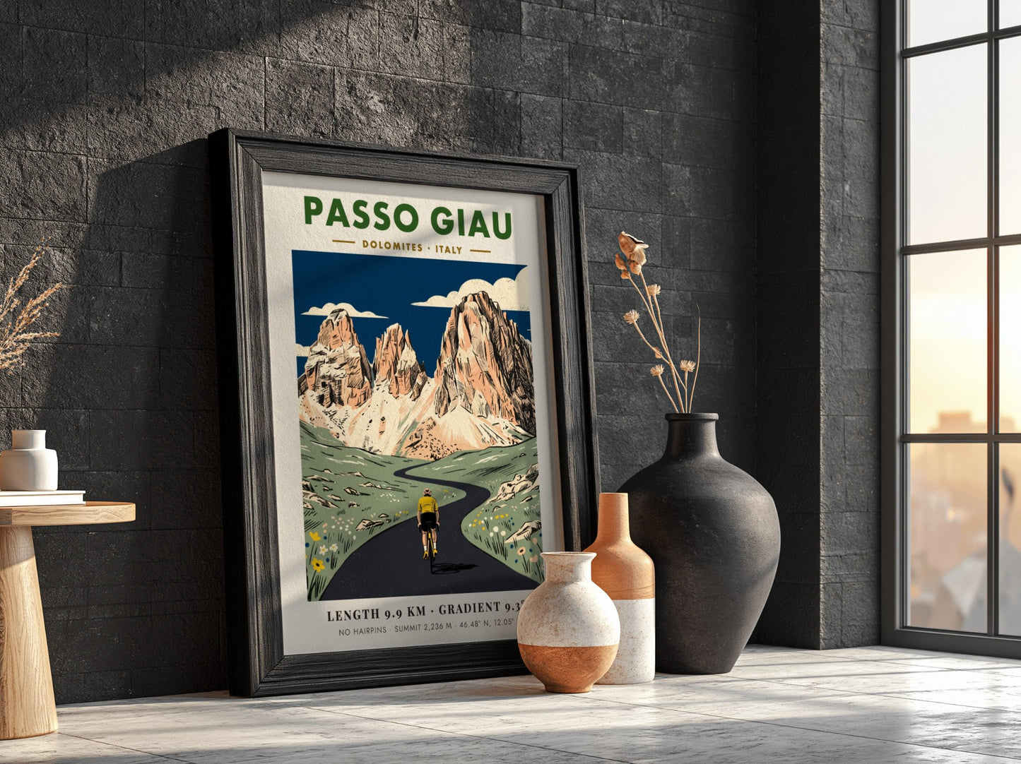 Passo Giau poster showing a cyclist riding toward jagged limestone mountains in Italy.