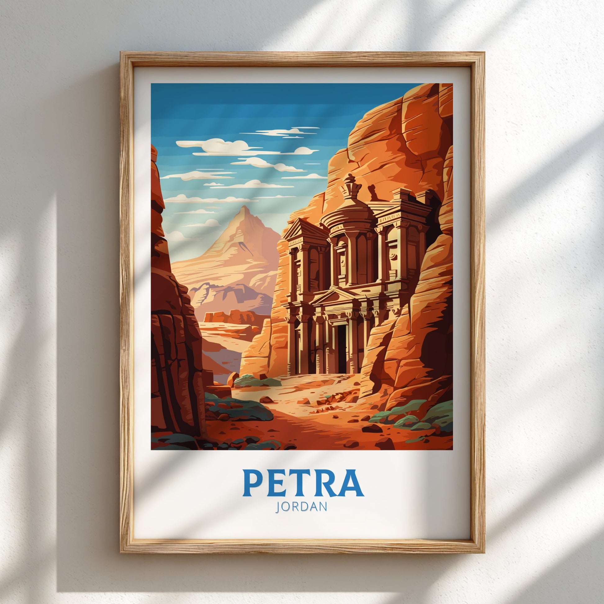 Framed poster of Petra, Jordan with desert landscape and architectural marvel.