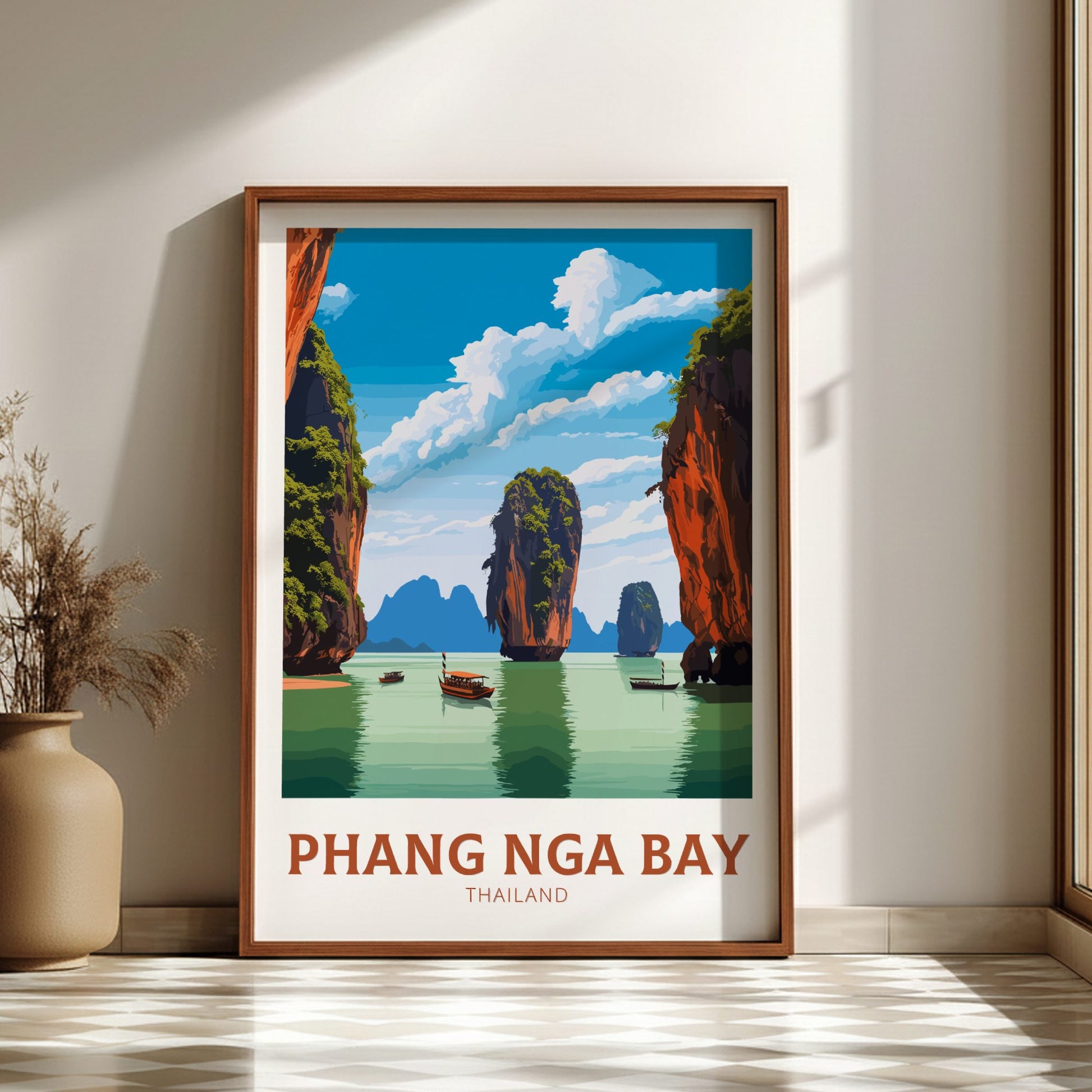 Framed poster of Phang Nga Bay with a wooden frame on a wall.