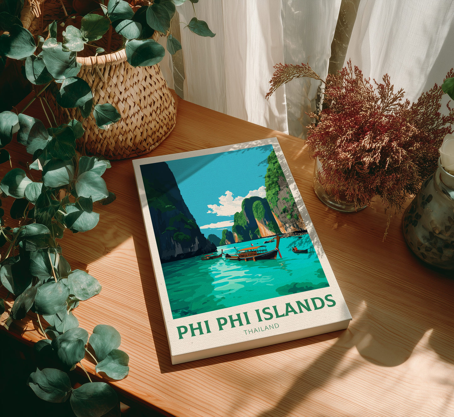 Canvas of 'Phi Phi Islands, Thailand' on a wooden table with plants around