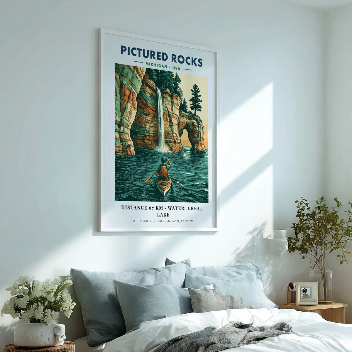 Poster of a kayaker paddling beneath colorful Pictured Rocks cliffs and a waterfall