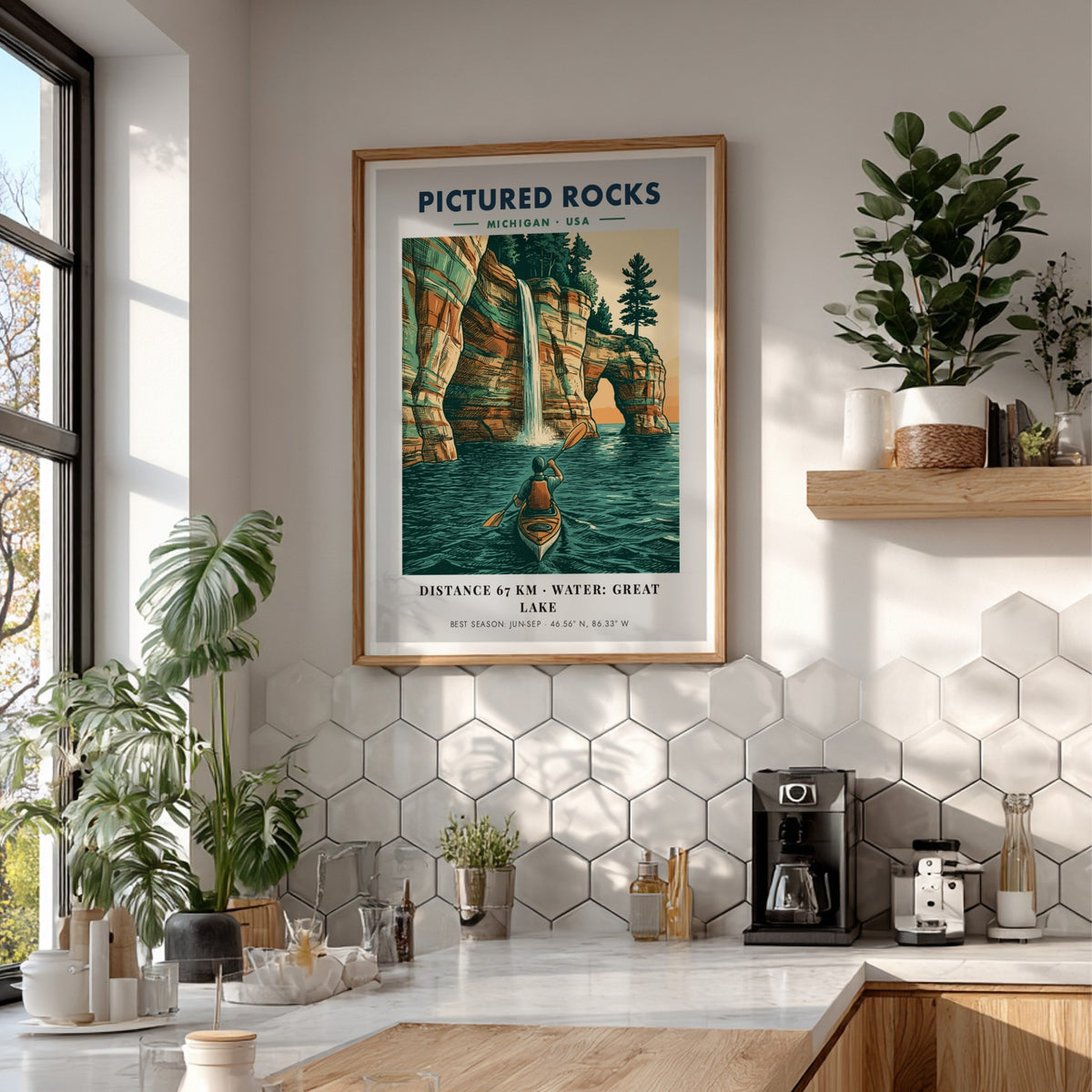 Poster of a kayaker paddling beneath colorful Pictured Rocks cliffs and a waterfall