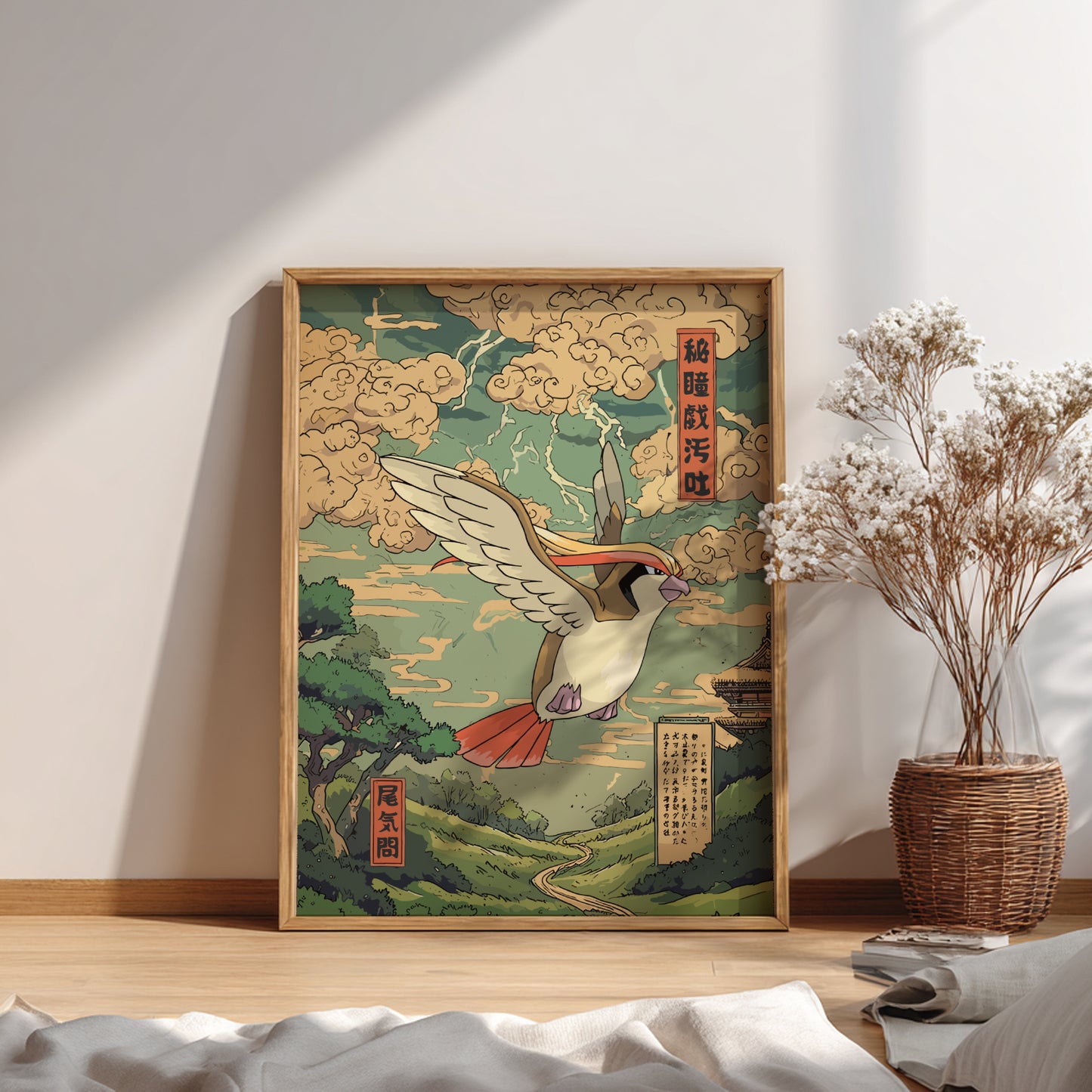 Framed artwork of Pidgeot Pokemon in a natural setting on a wall with a vase of flowers.