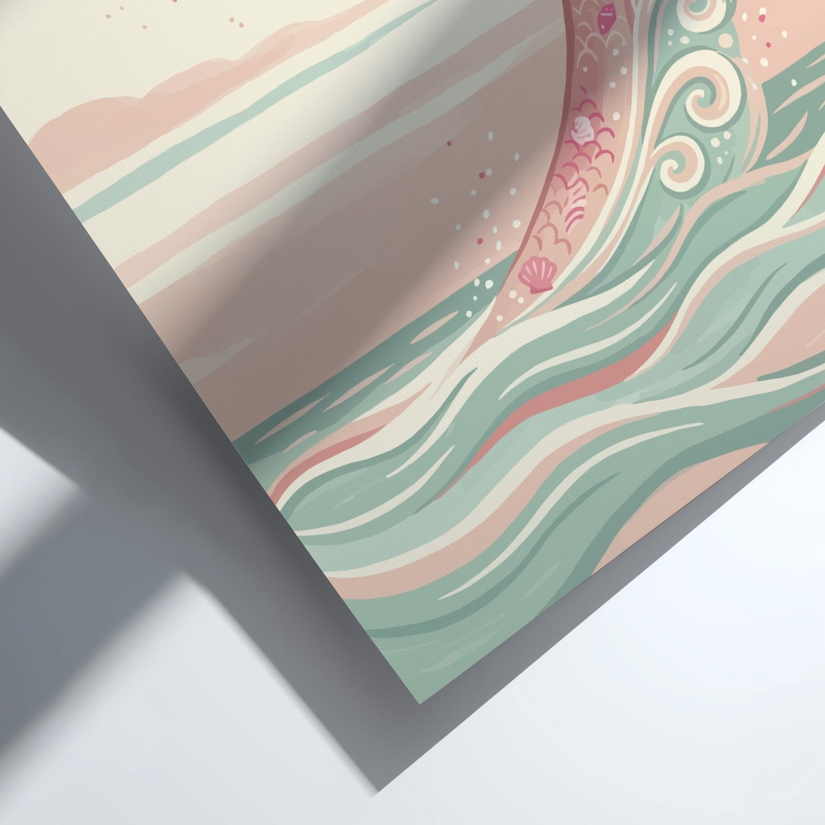 Wall art featuring a pink mermaid tail with seashell accents above soft ocean waves.