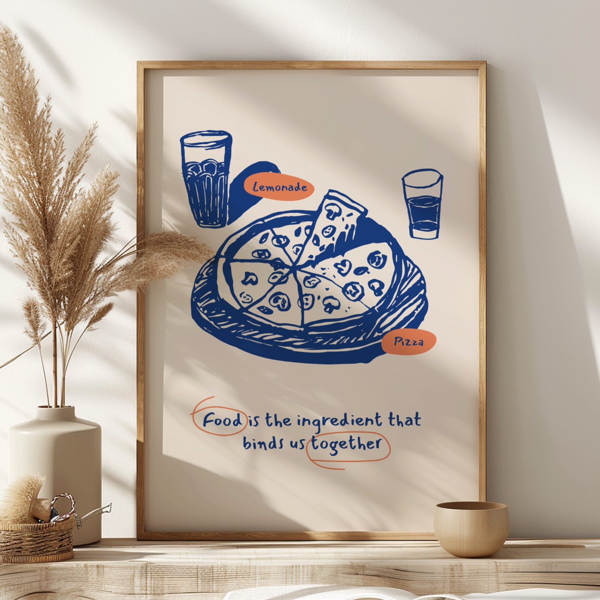 Framed illustration of a pizza and lemonade with a quote on a wall with decorative elements.