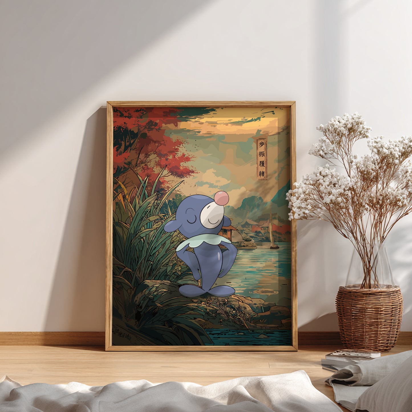 Framed artwork with Popplio Pokemon character in a scenic setting on a wall.