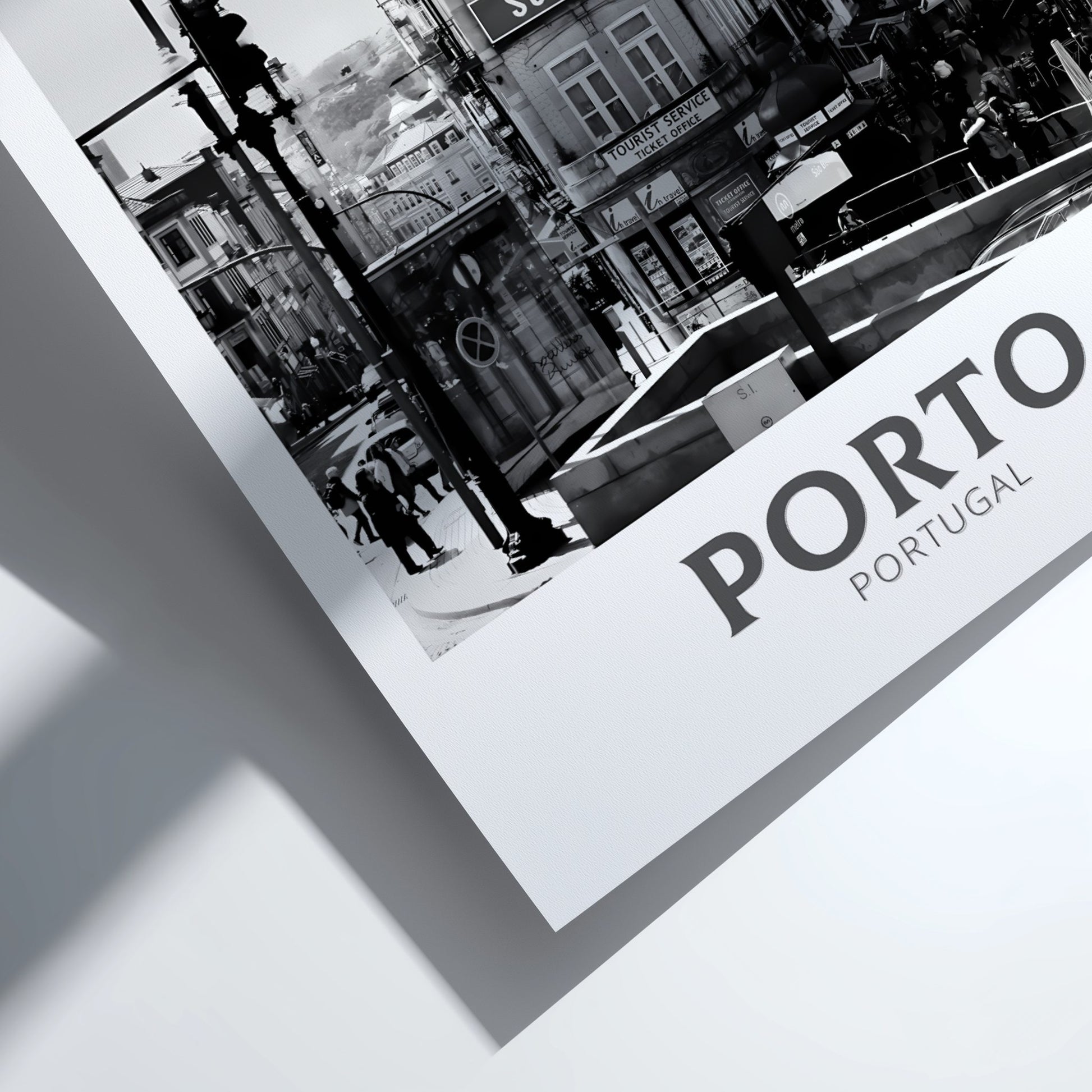 Framed black and white photo of a city street with 'Porto Portugal' text.