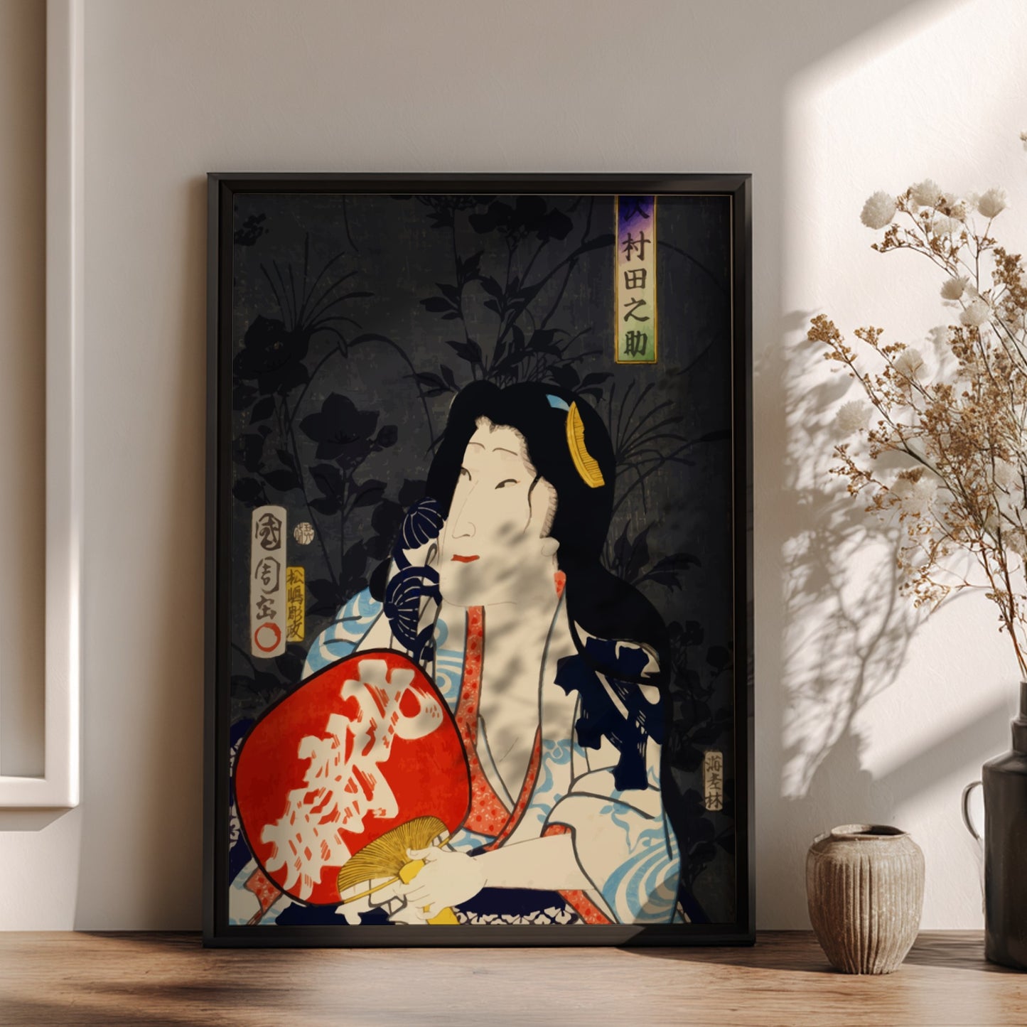 Poster of a Japanese actor portrait in ukiyo-e style by Toyohara Kunichika, featuring red fan.