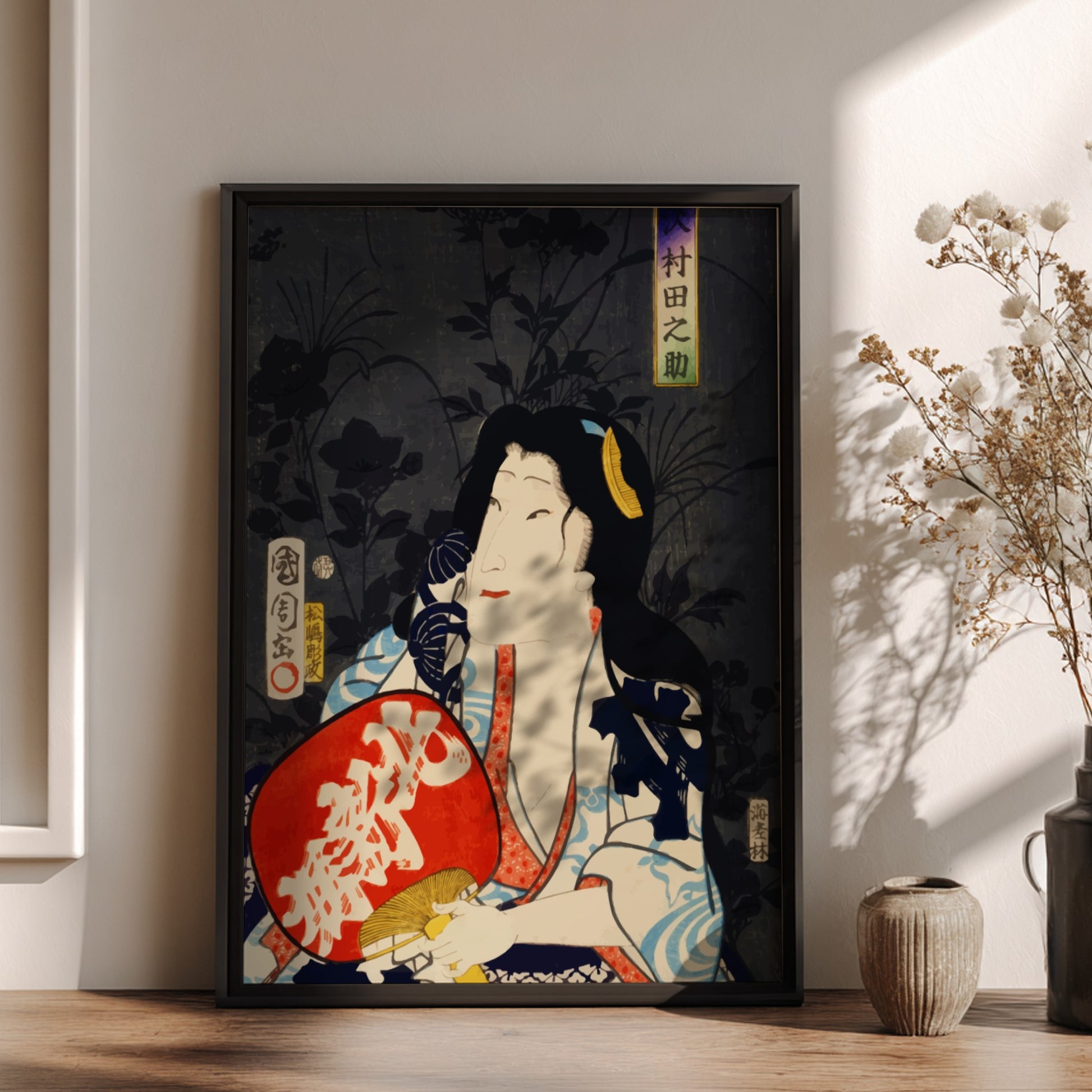 Poster of a Japanese actor portrait in ukiyo-e style by Toyohara Kunichika, featuring red fan.