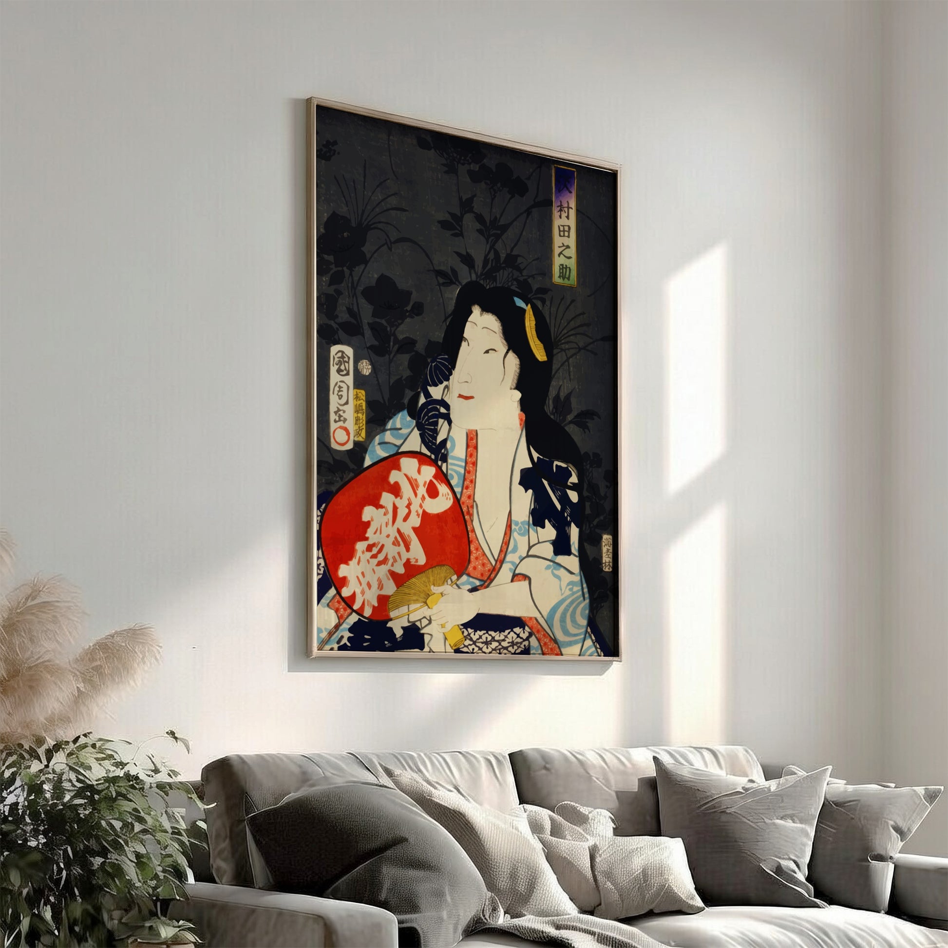 Poster of a Japanese actor portrait in ukiyo-e style by Toyohara Kunichika, featuring red fan.