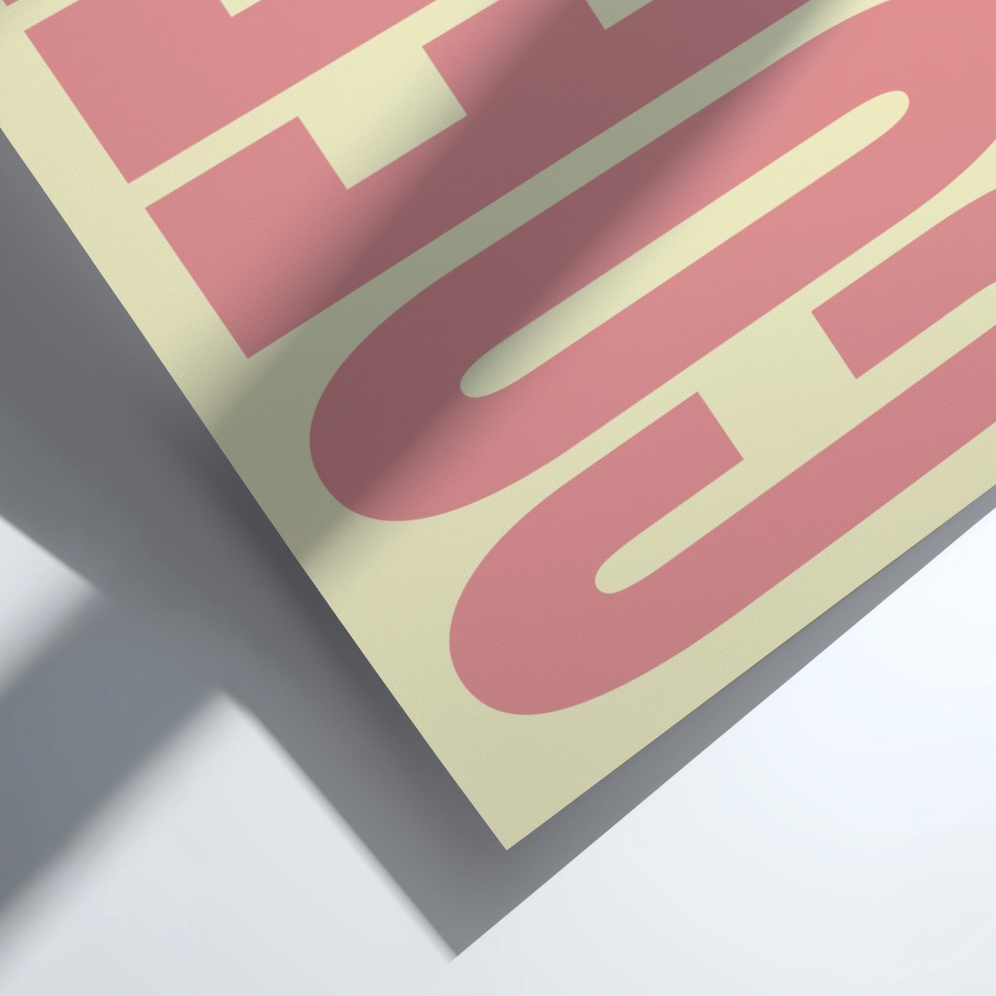 Close-up of a pink and yellow product with a textured surface on a white background